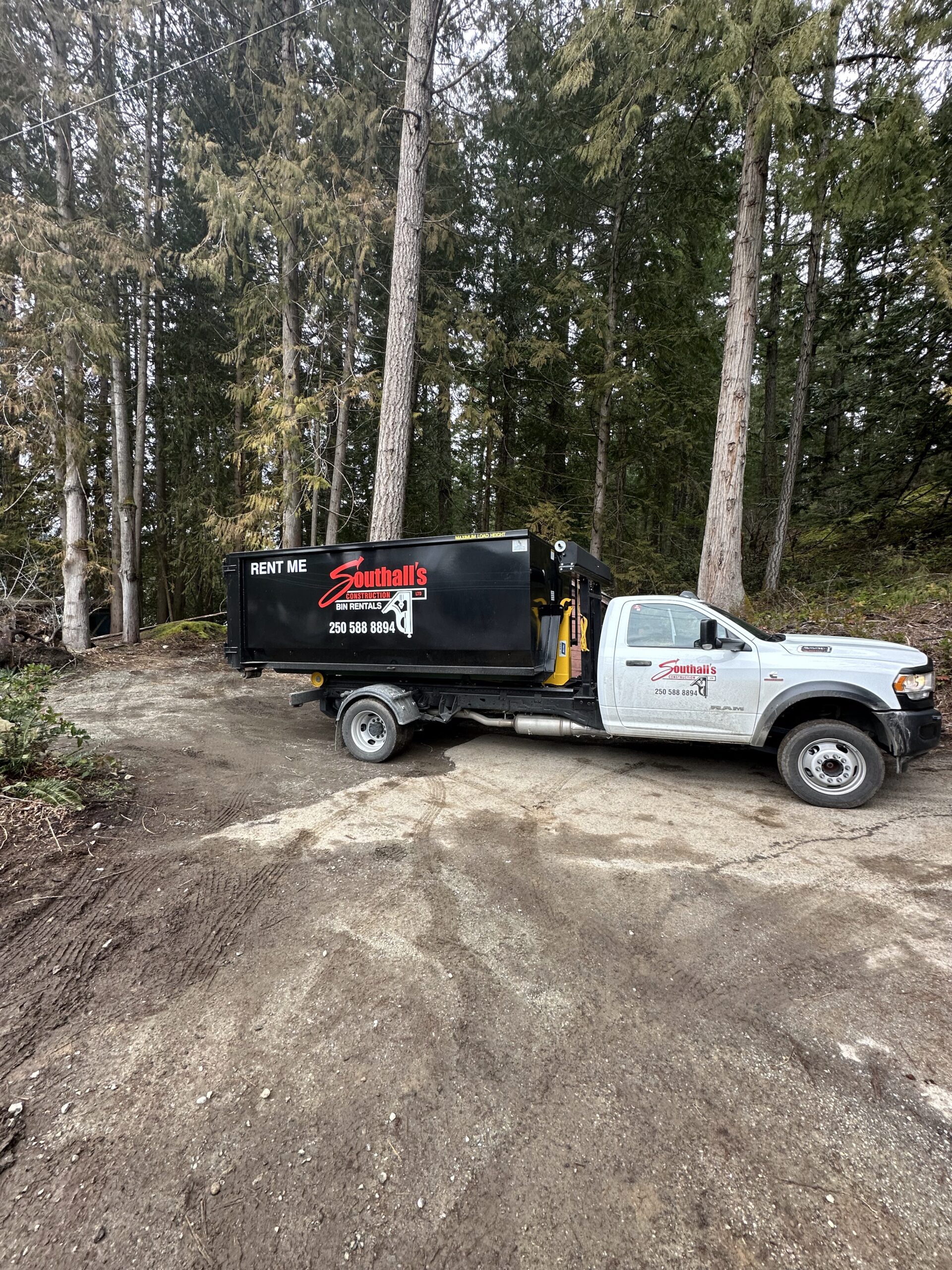 Professional dump truck hauling materials for spring landscaping renovation in Cowichan Valley BC