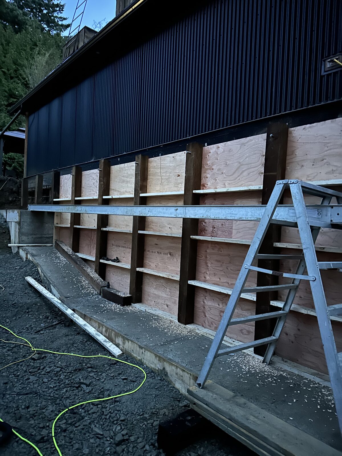 Formwork beside the existing house for underpinning work — garage addition and house underpinning project