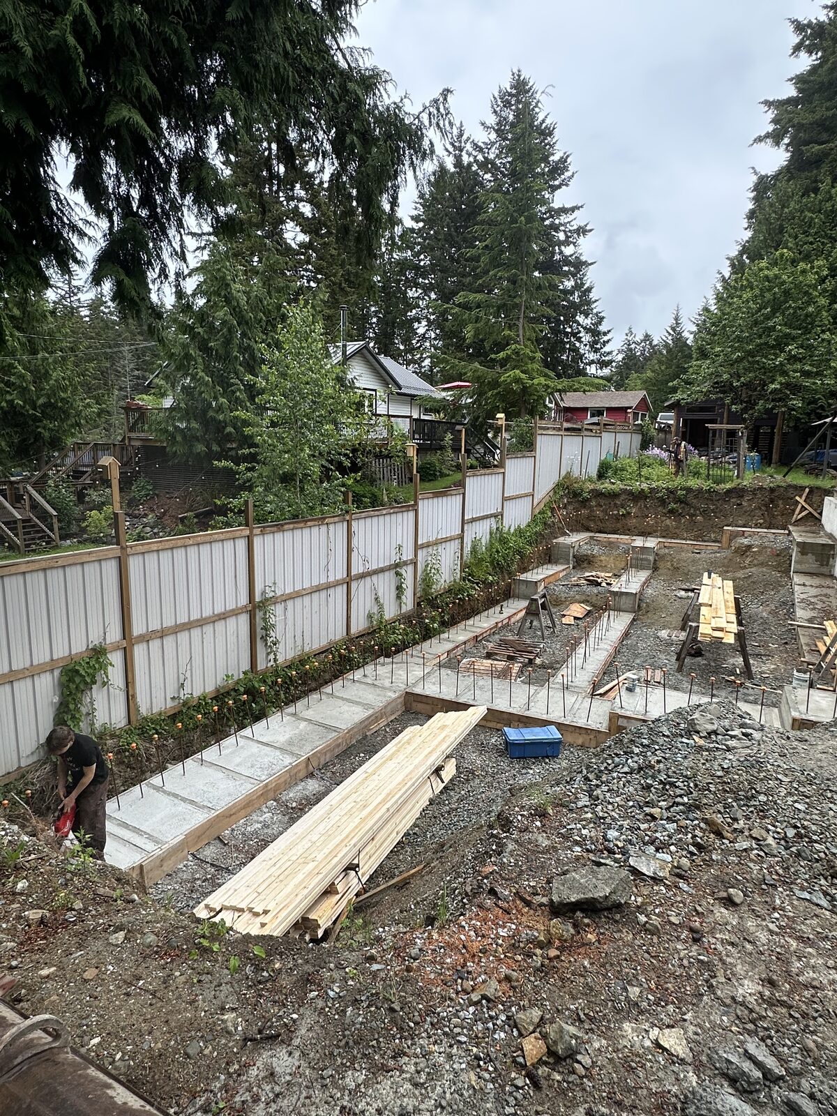 Garage addition foundation forms in progress — garage addition and house underpinning project