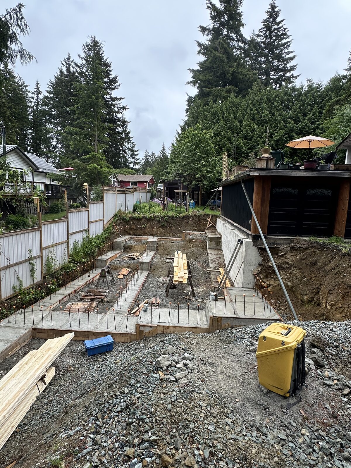 Foundation layout and formwork across the garage addition — garage addition and house underpinning project
