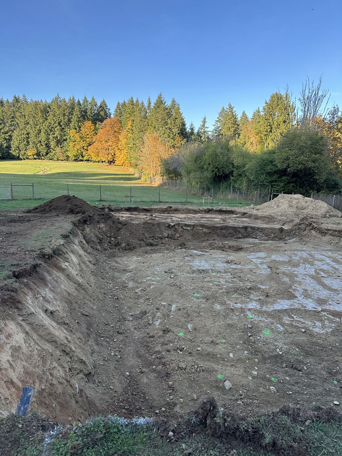 Foundation excavation beside the existing ground — Mill Bay excavation and foundation project