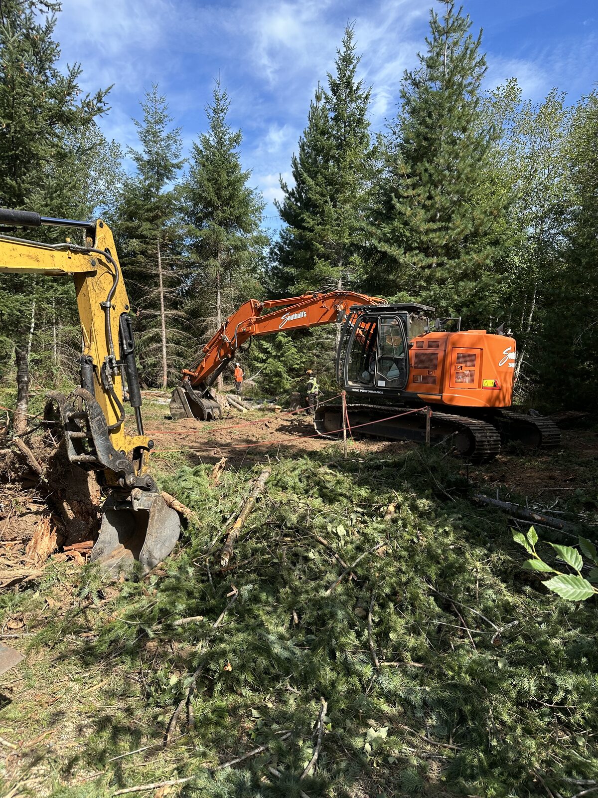 Excavators clearing trees and brush at the West Shawnigan site