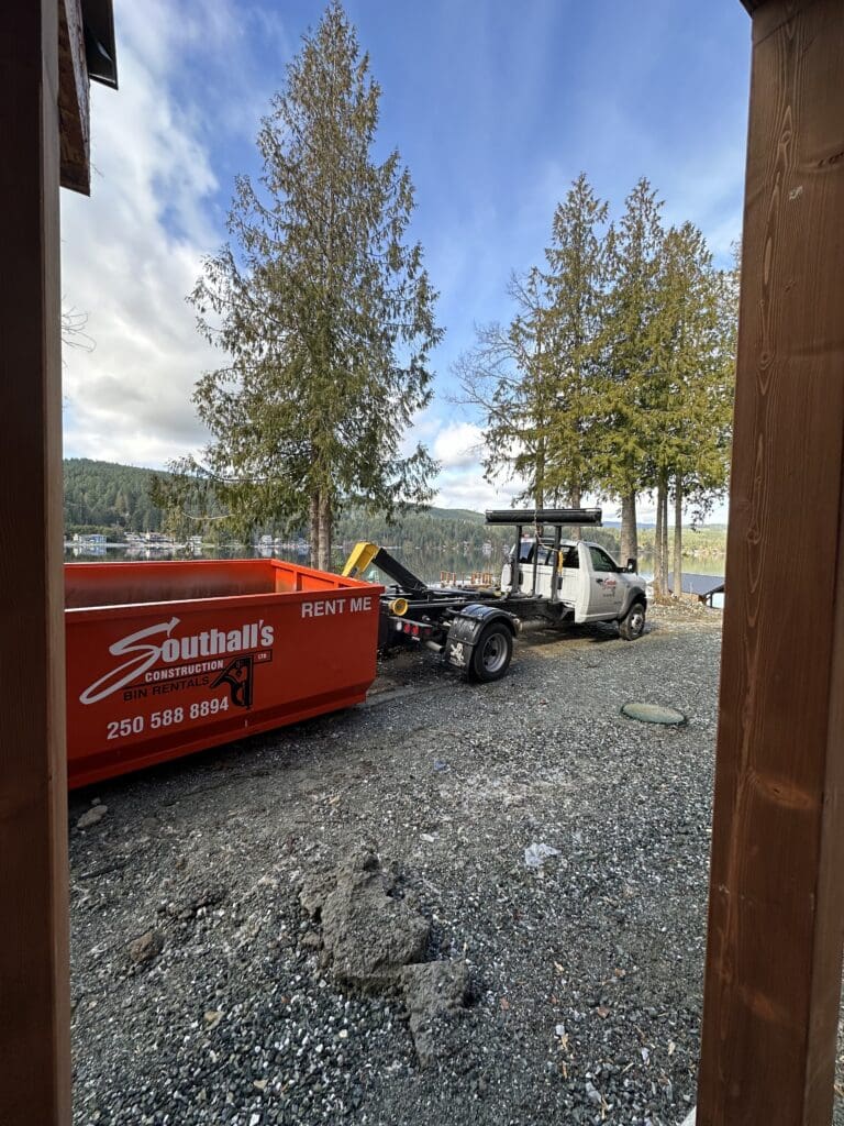 Orange Southall Services rental bin placed on a residential excavation site in the Cowichan Valley
