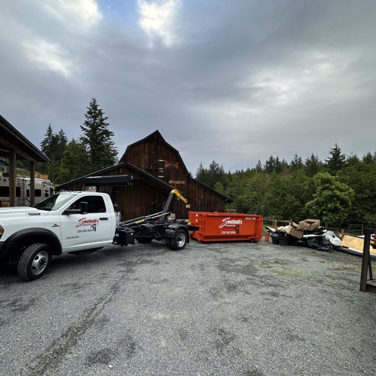 12-yard bin rental dropped off at a rural residential property with construction debris during a winter cleanout in the Cowichan Valley, BC